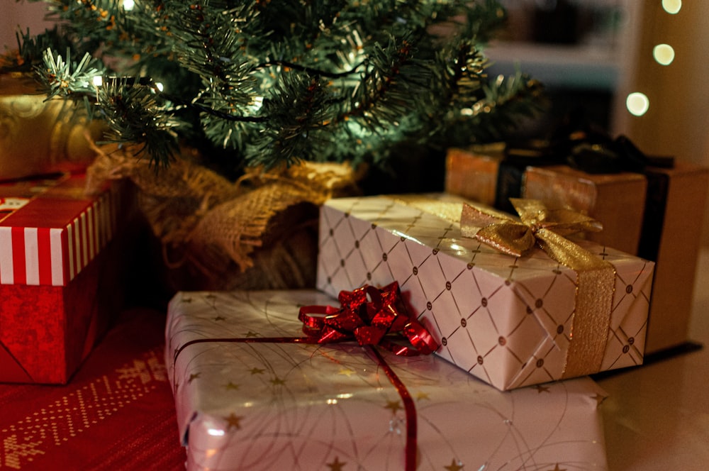 red and gold gift boxes on table