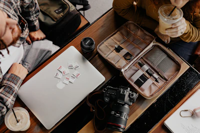 A workspace featuring various computer accessories and cartridges ready for refilling.
