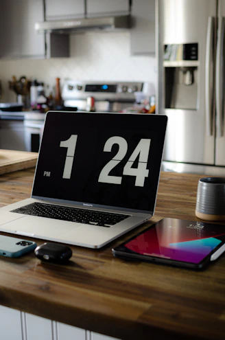 A sleek set of modern household gadgets displayed on a kitchen counter.
