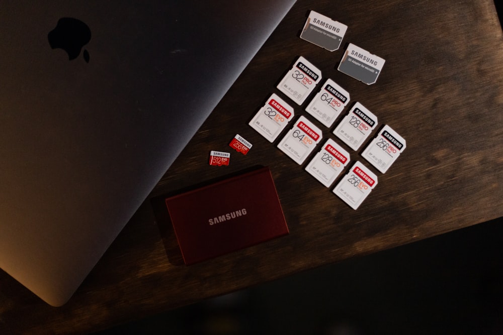 white and red box on brown wooden table