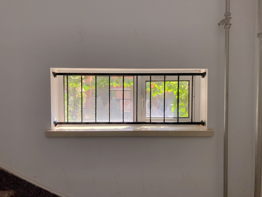 white wooden framed glass window