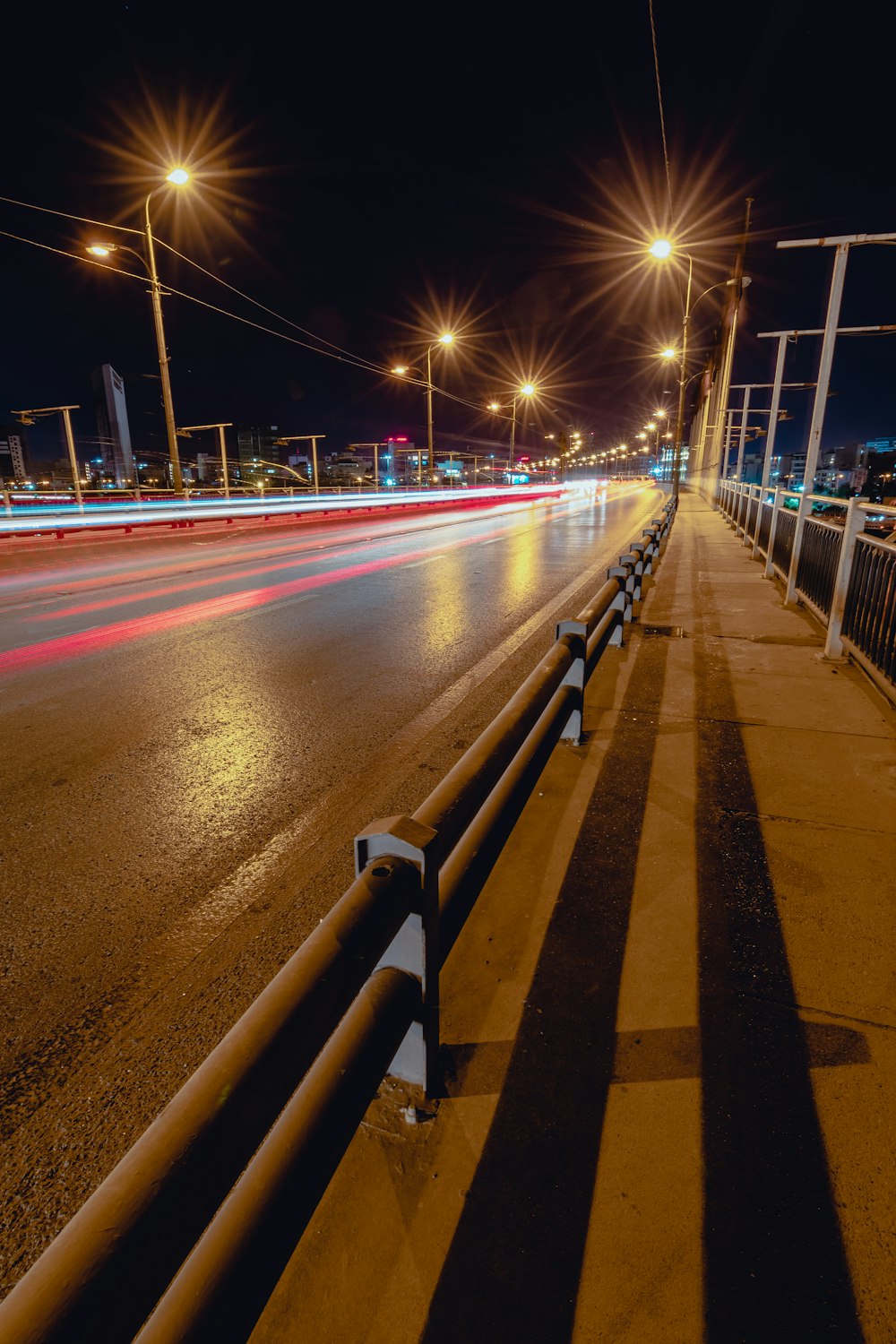 time lapse photography of cars on road during night time