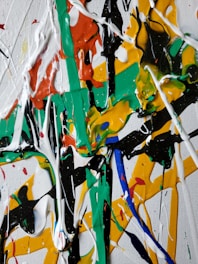 white green red and yellow abstract painting