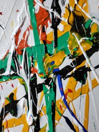 white green red and yellow abstract painting