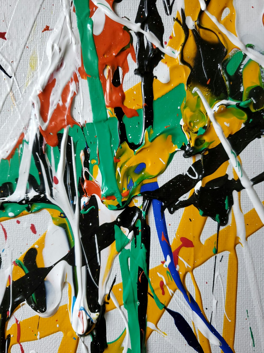 white green red and yellow abstract painting