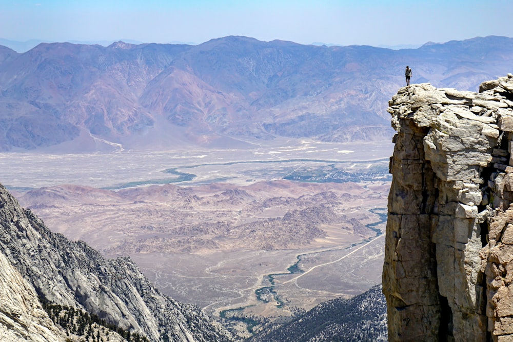 brown rock formation on top of mountain during daytime