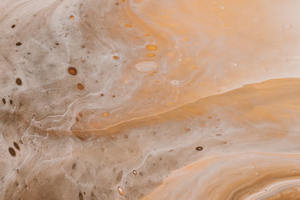 water splash on brown sand