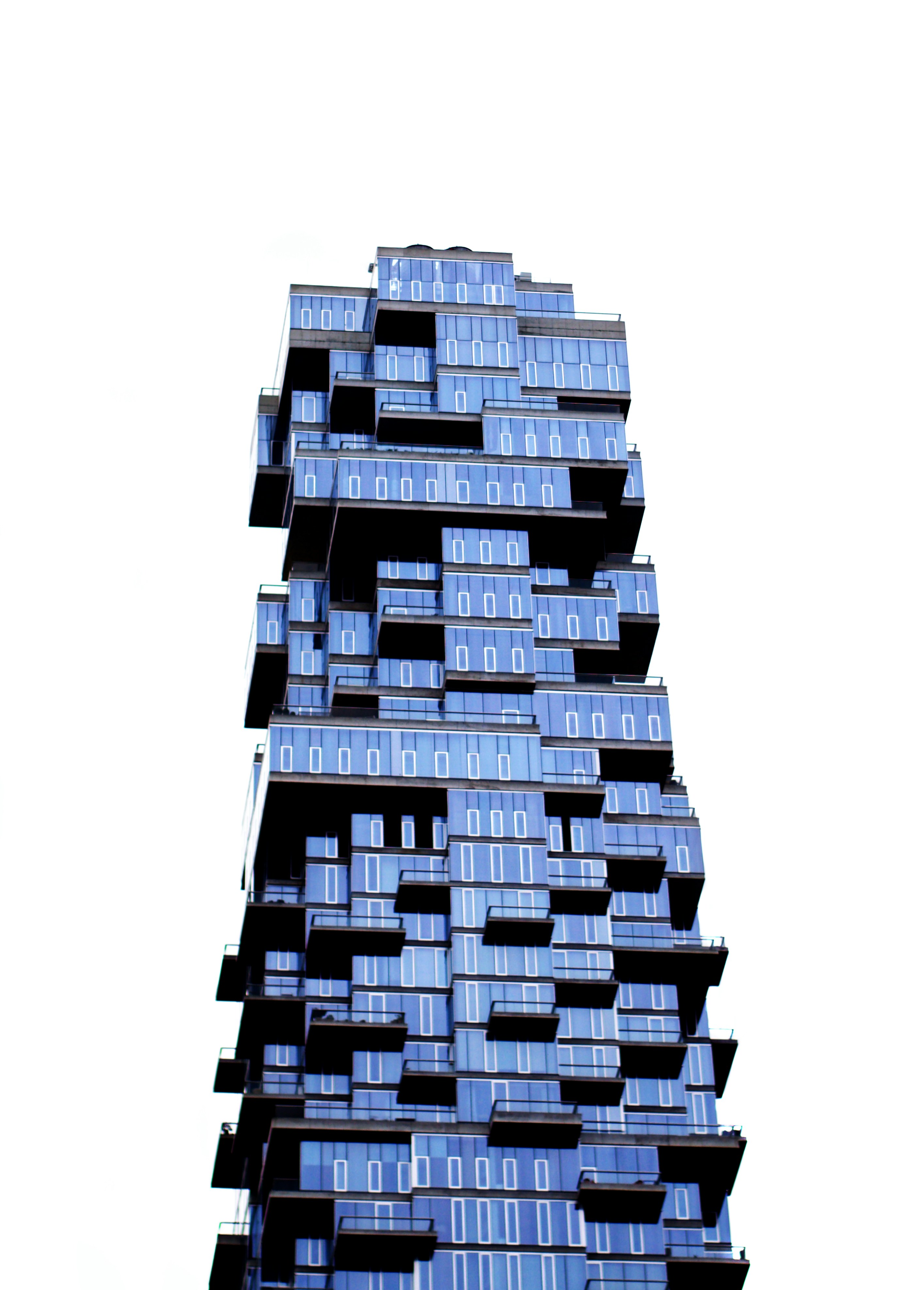 woman wearing yellow long-sleeved dress under white clouds and blue sky during daytime