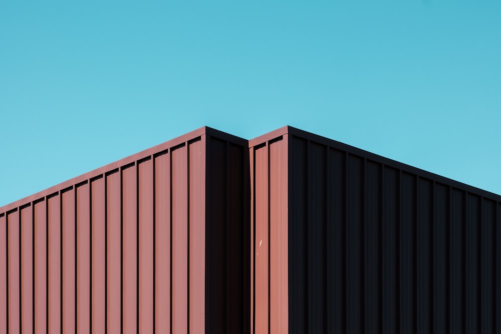 brown wooden fence under blue sky during daytime