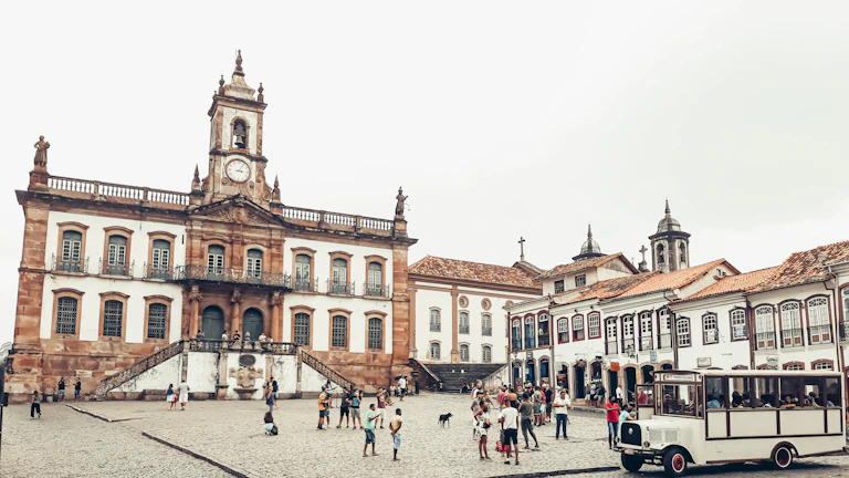 Historic town square of Santo Domingo Antioquia with people gathered during a local festival
