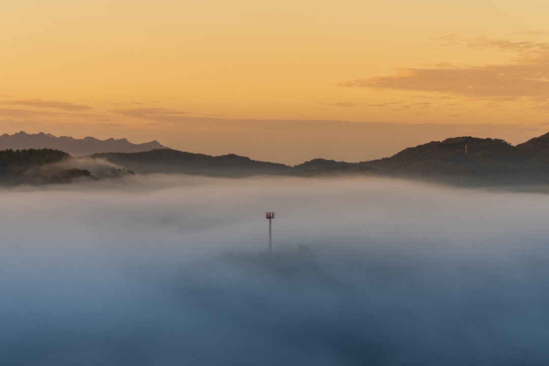 mountains and clouds during daytime