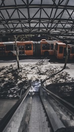 A seamless transit hub featuring bikes, electric scooters, and buses connecting diverse city districts.