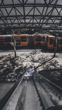 A seamless transit hub featuring bikes, electric scooters, and buses connecting diverse city districts.