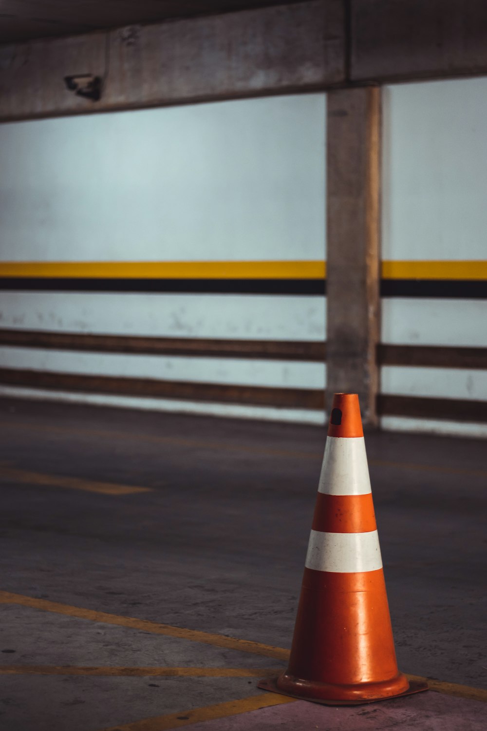 orange and white striped traffic cone