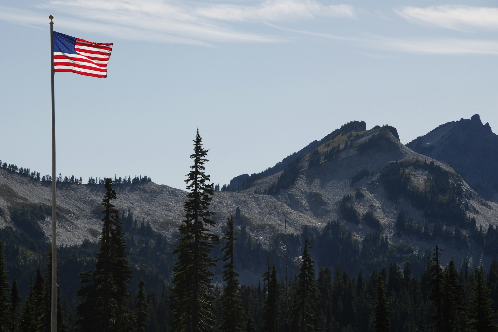 us a flag on top of mountain