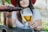 A happy customer enjoying a drink delivered by Brew Drone.