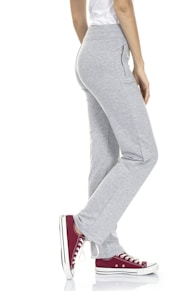 woman in gray tank top and gray pants