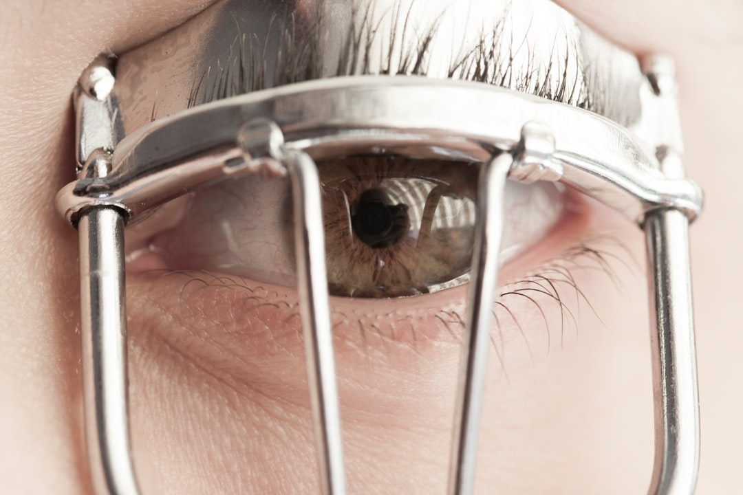 person wearing silver framed eyeglasses