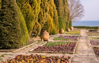 A beautifully landscaped garden with colorful flowers and pathways.