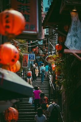 A group of travelers enjoying a guided tour through the bustling Muslim Quarter market.