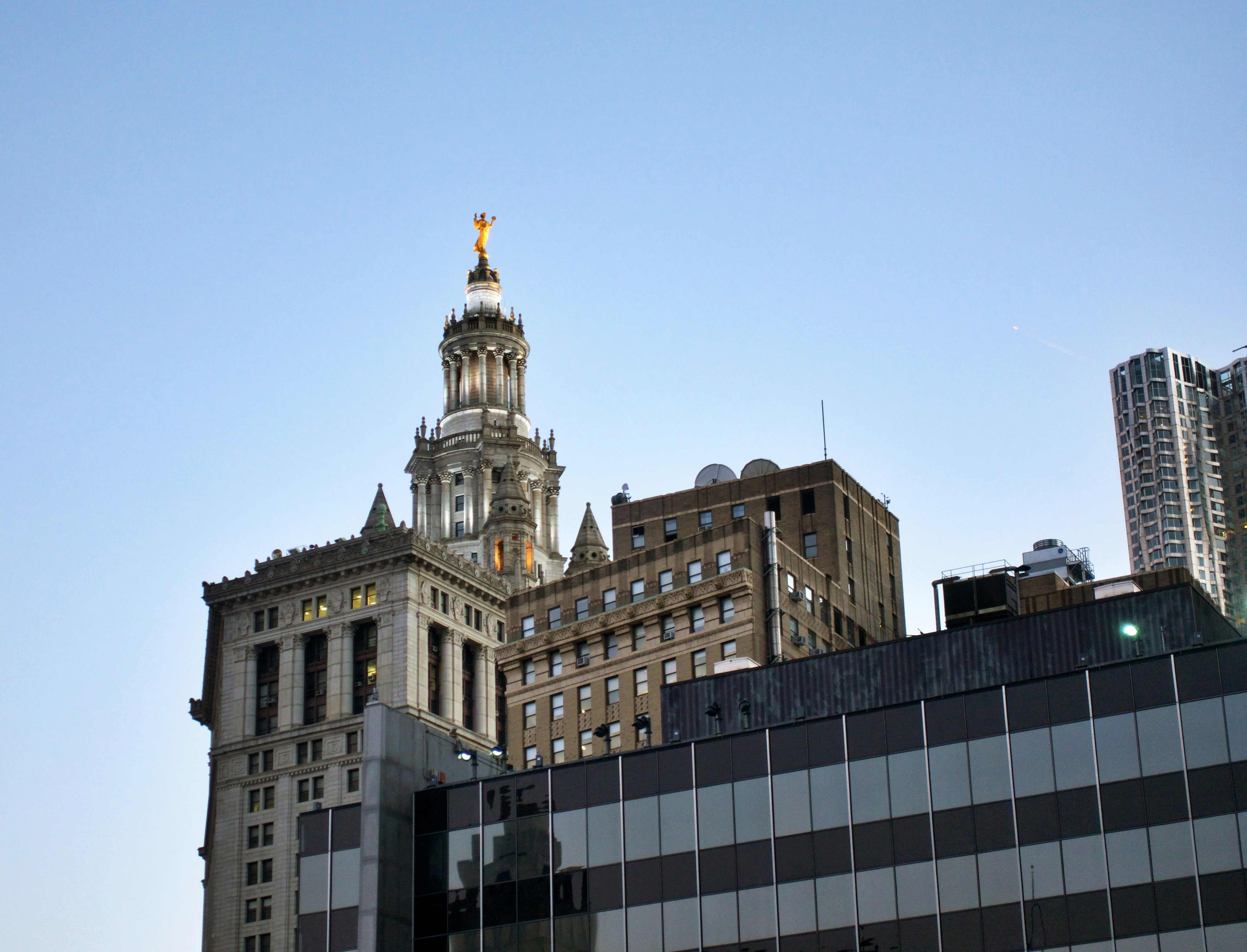 white concrete building under blue sky during daytime