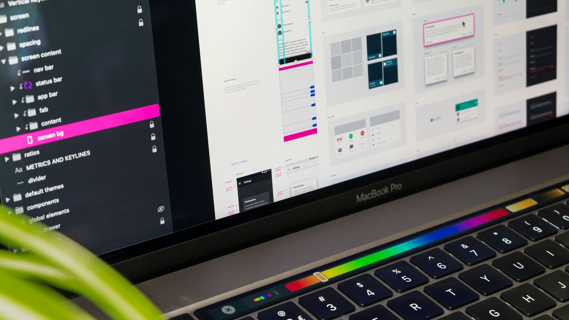 MacBook Pro displaying design work representing UX/UI design excellence