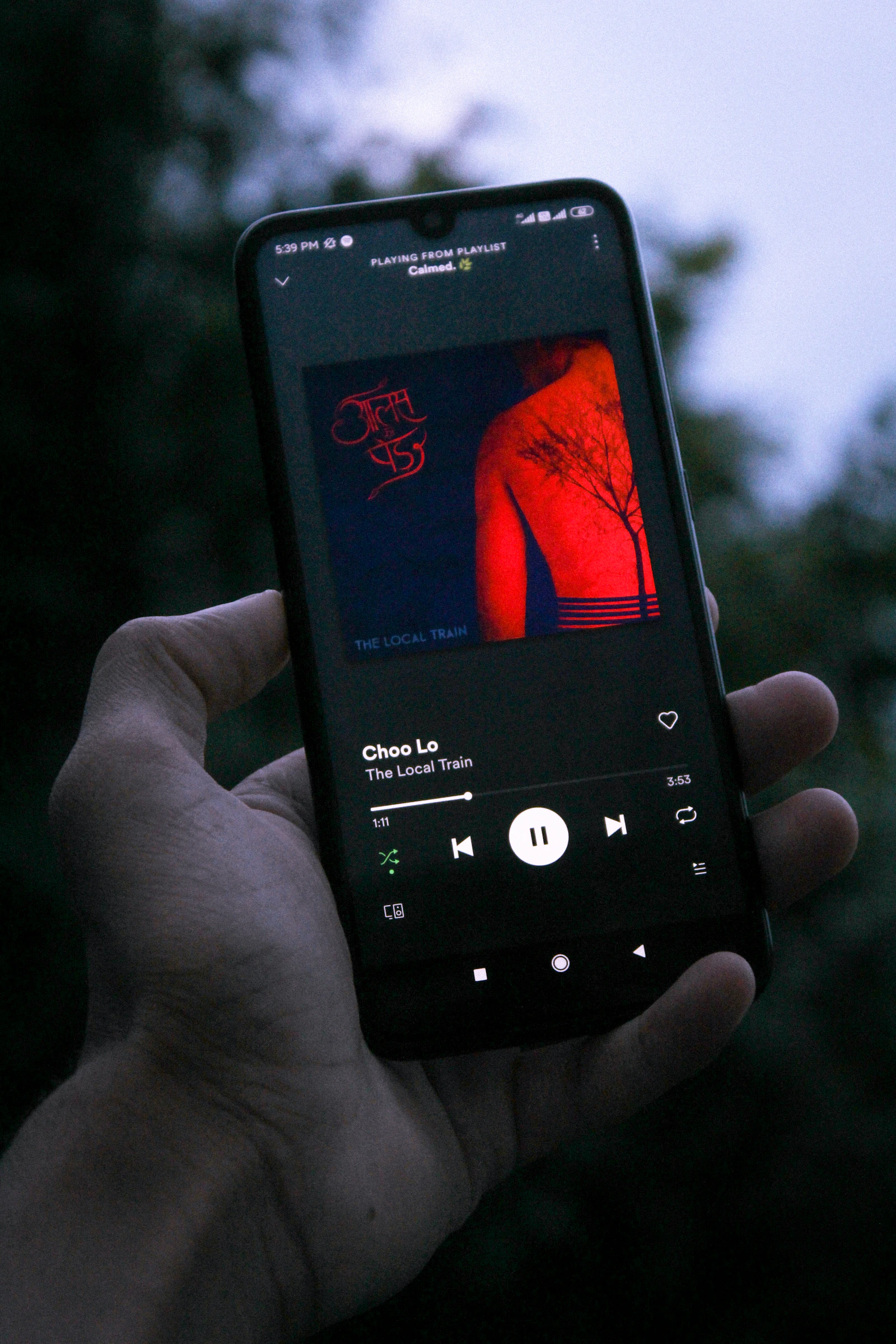 Person holding an Android smartphone