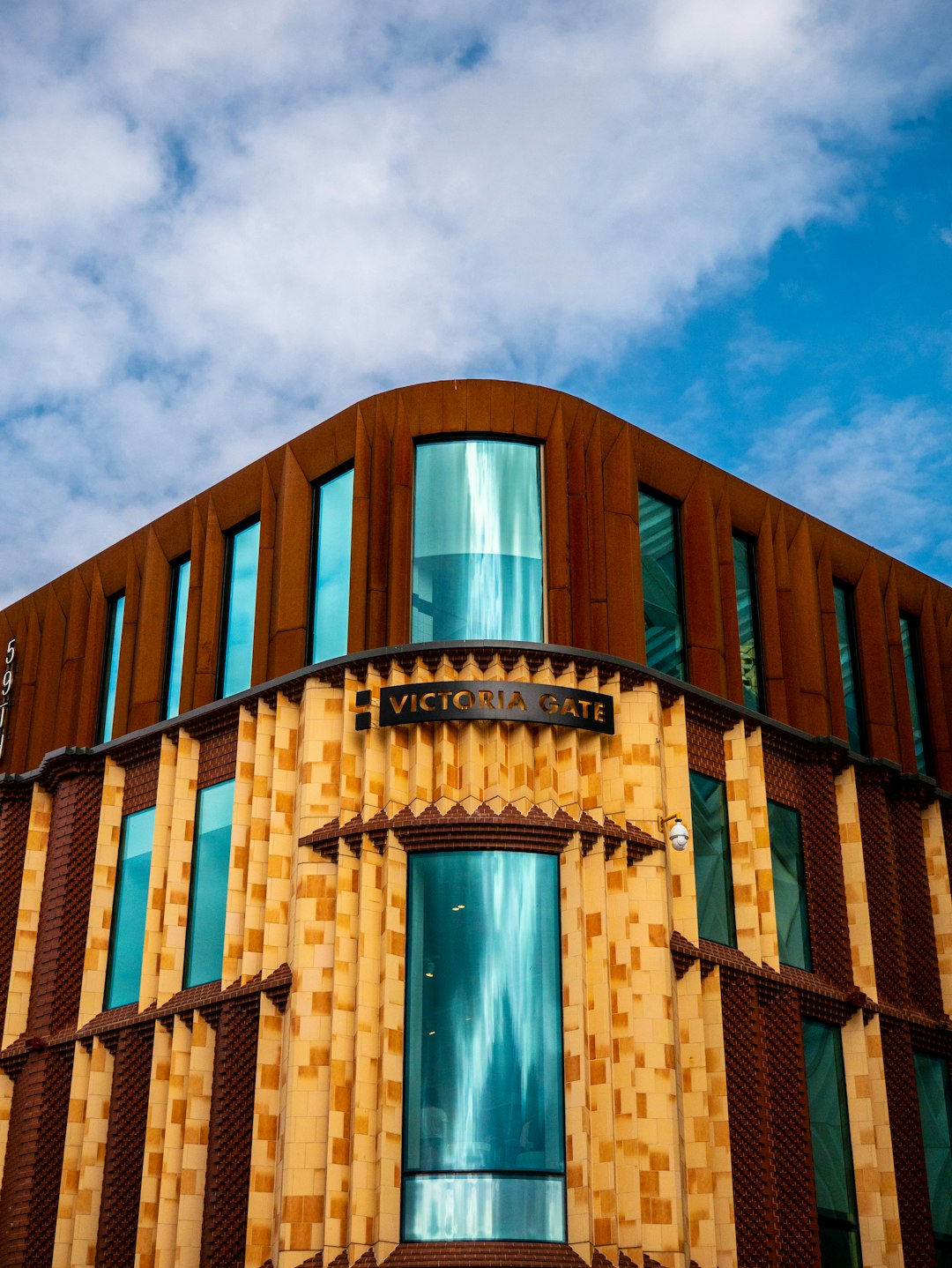 brown concrete building under blue sky during daytime