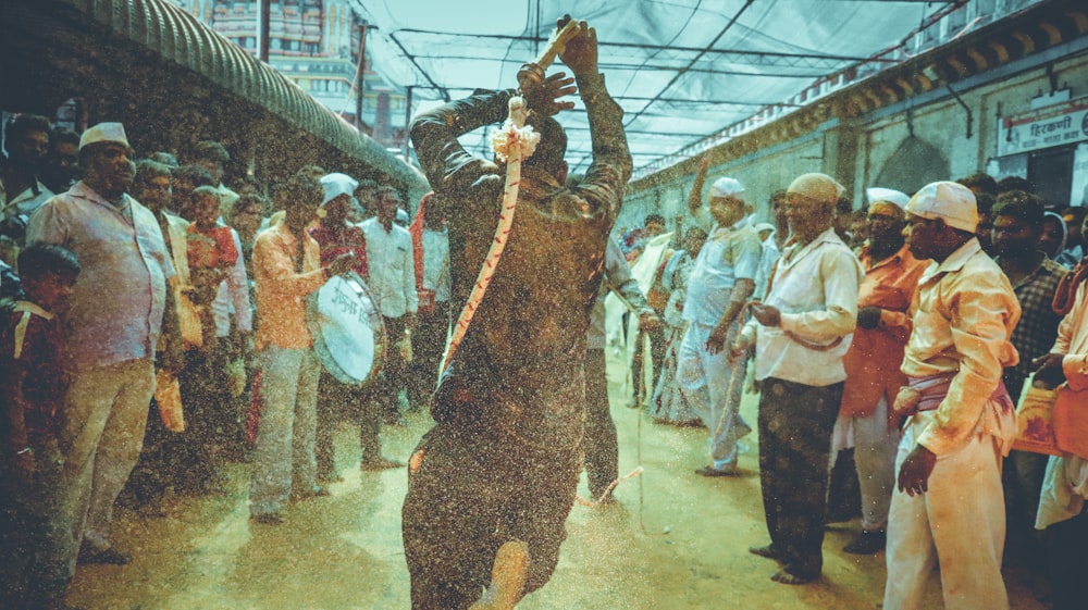 people standing near brown elephant statue during daytime