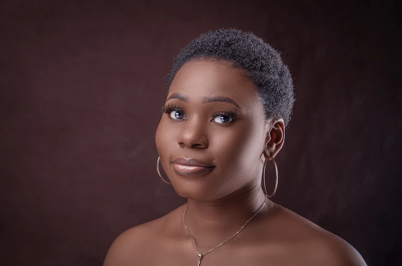 woman wearing silver hoop earrings