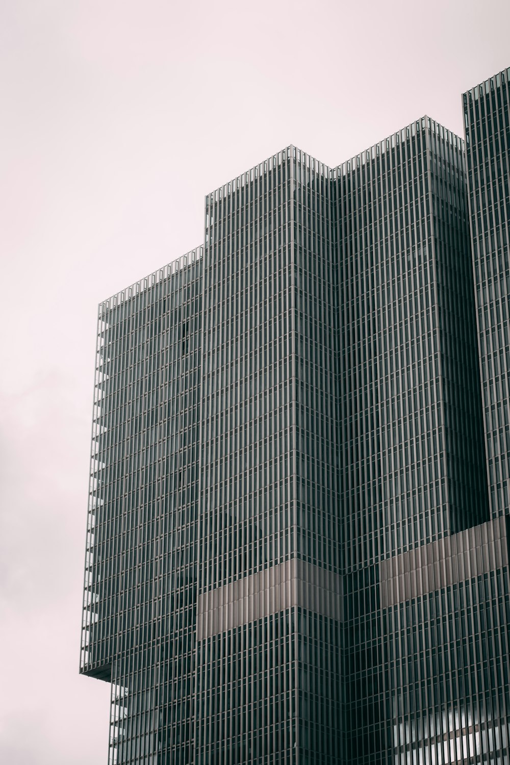 black concrete building under blue sky during daytime