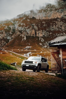 An adventurous SUV parked in a scenic outdoor location.