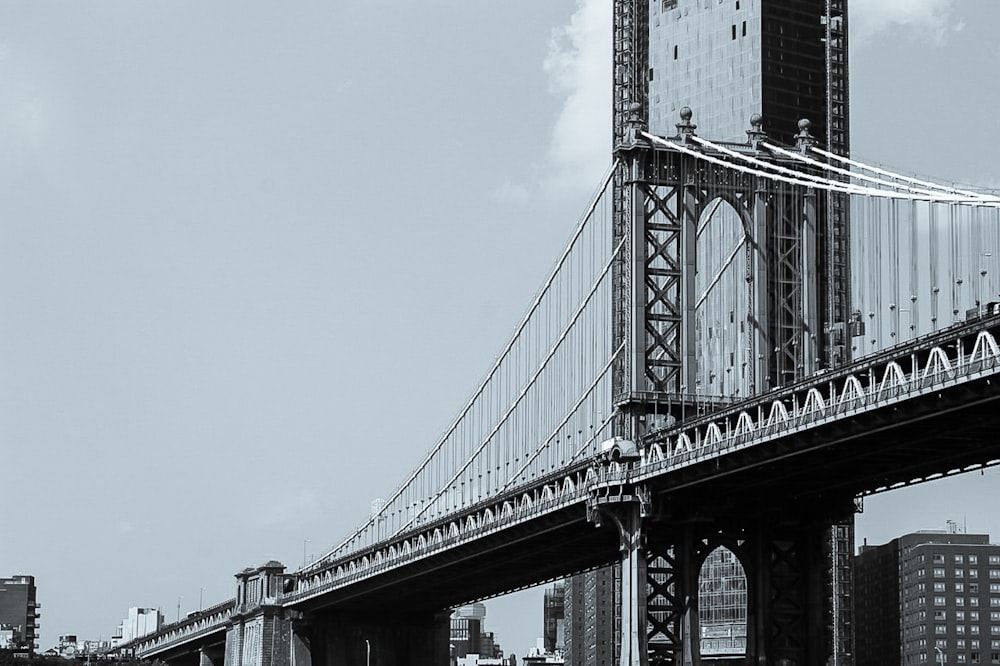 gray bridge under blue sky during daytime