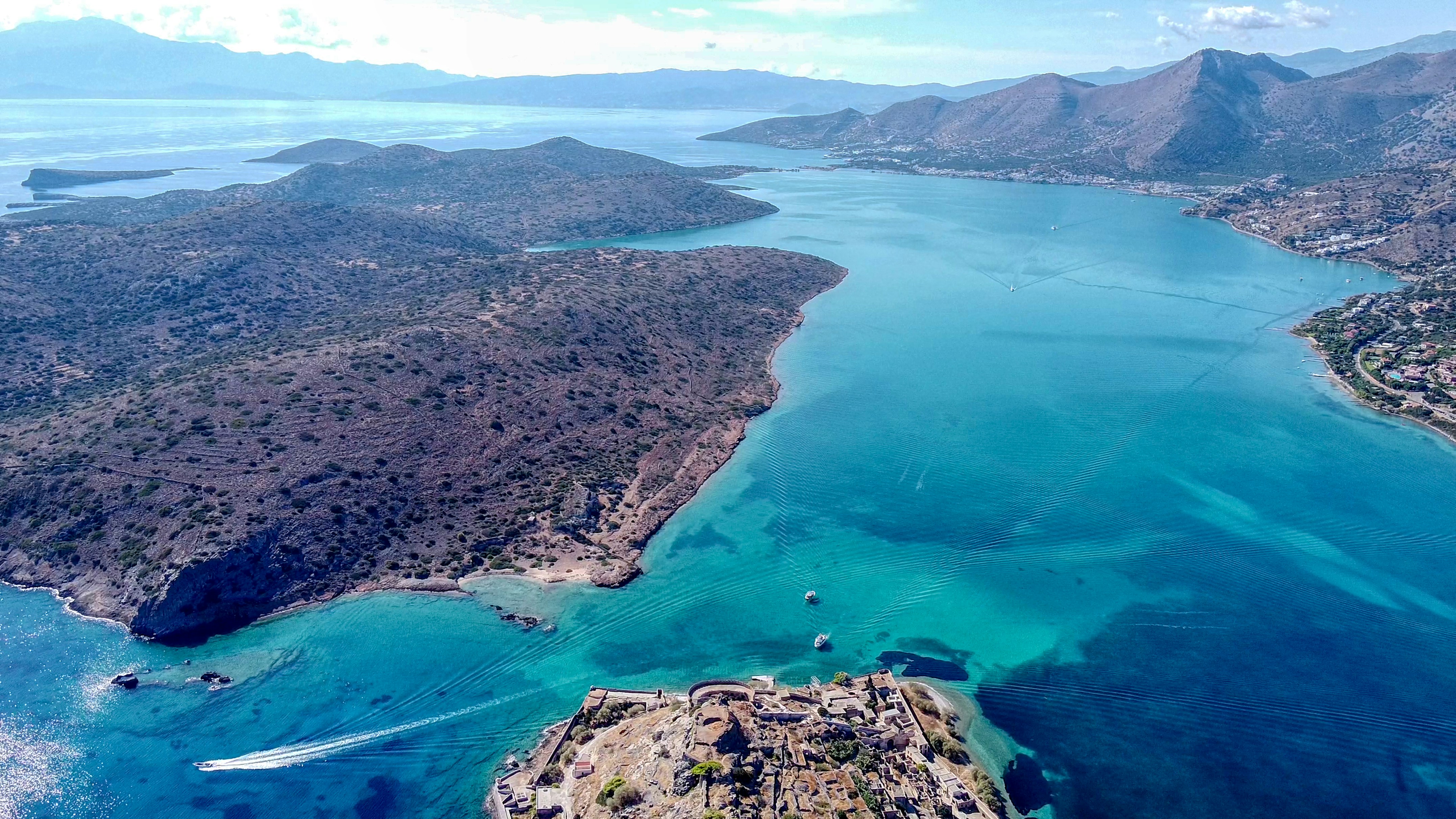 aerial view of green and brown mountains and body of water during daytime, Great day, Great view with Drone over Spinalonga viewing the bay of Elounda. Photo taken 12 Oct. 2020</p><p>www.youtube.com/Evangelos Mpikakis</p><p>Instagram  @mpikman</p><p>Instagram @cretebydrone</p><p>Facebook cretebydrone</p><p>Twitter @cretebydrone