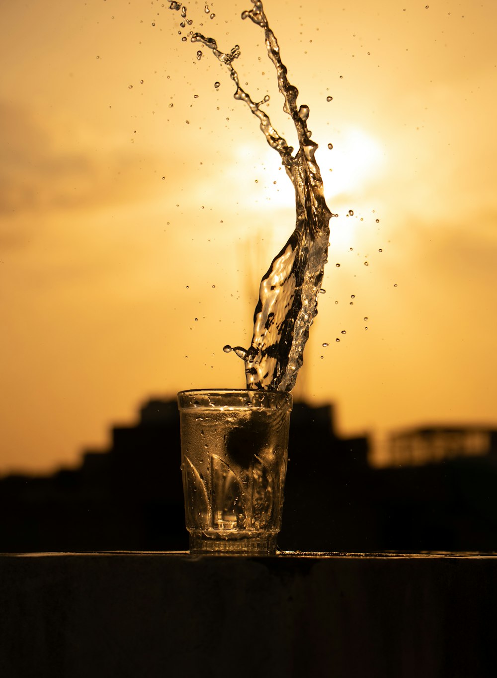 water splash in clear drinking glass