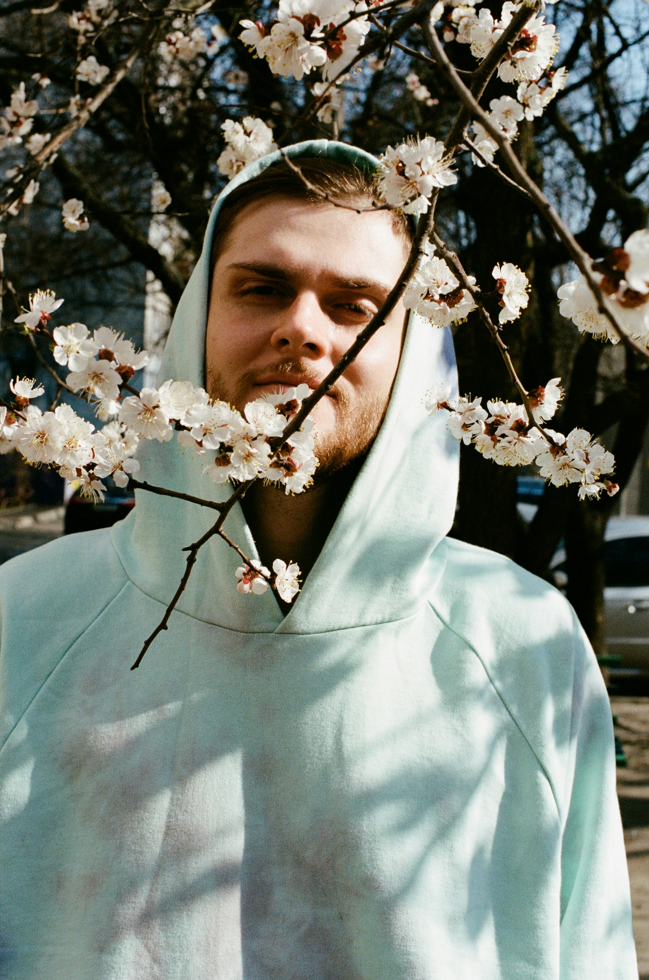 woman in white hijab with white flowers on her head