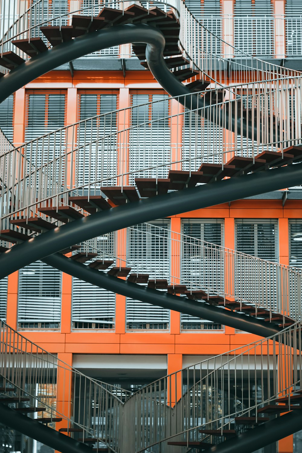 black metal railings near brown concrete building during daytime