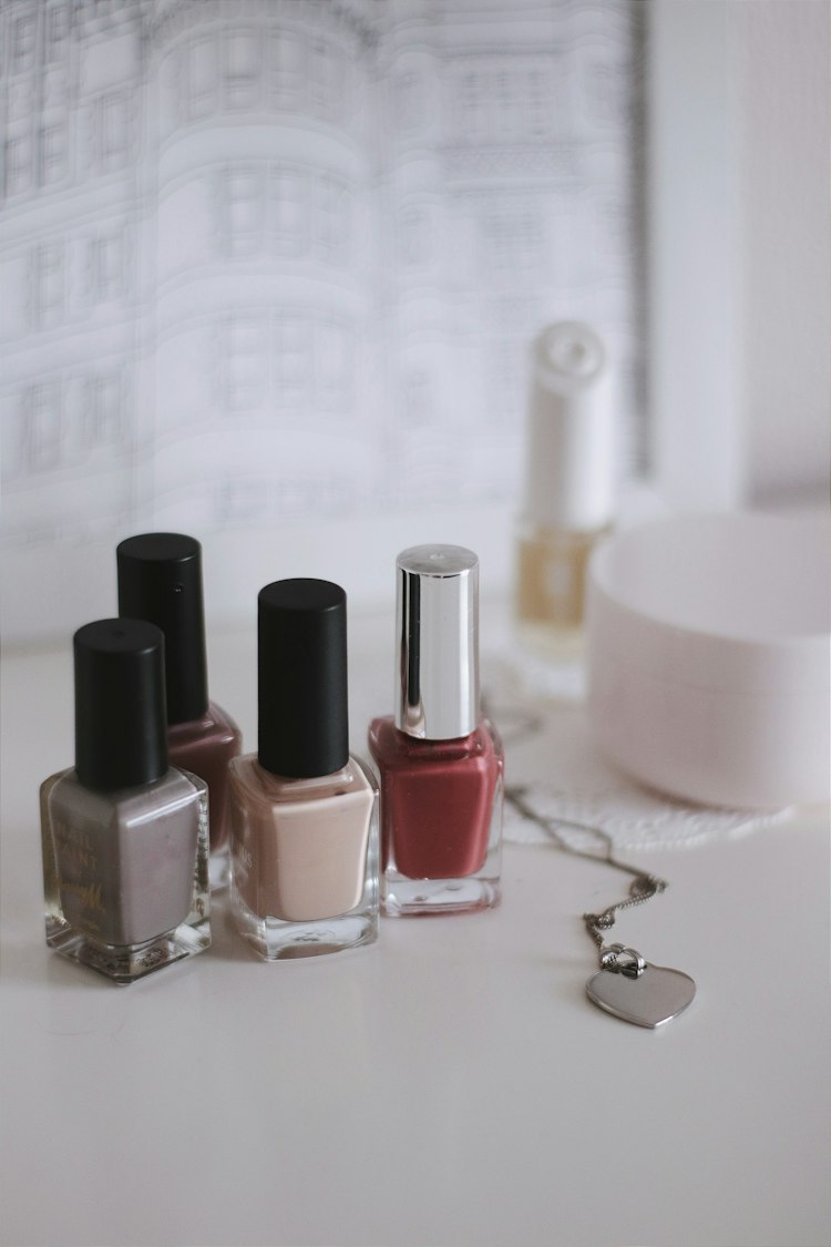 Nail polish bottles in soft neutral shades