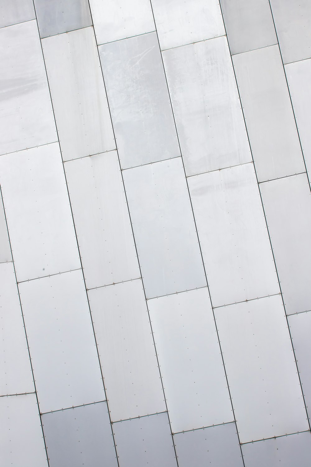 white ceramic tiles in room