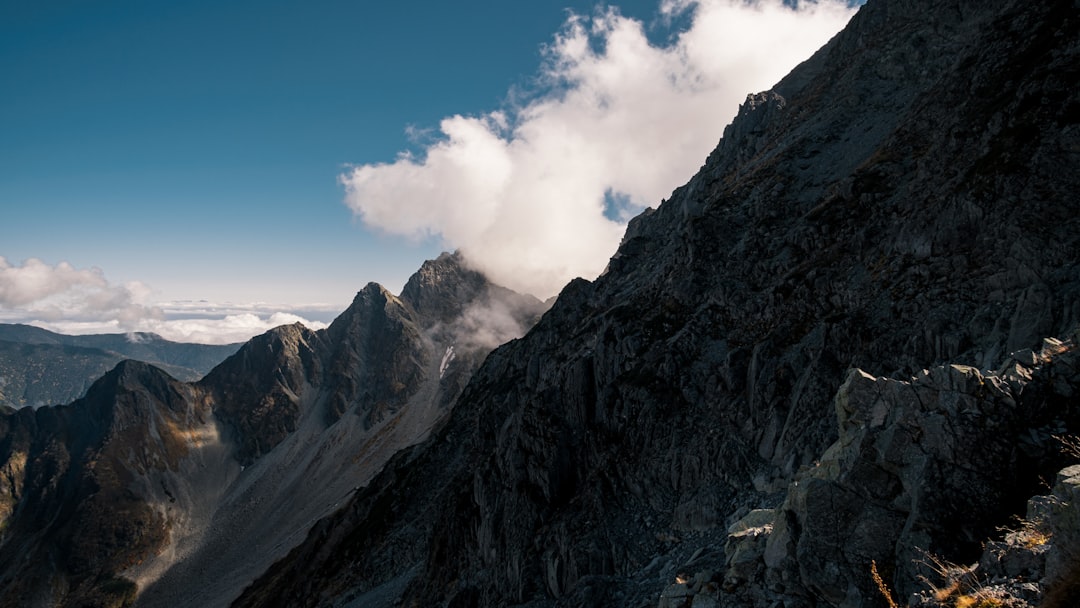 rocky mountain under blue sky during daytime