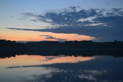 body of water under cloudy sky during daytime delaware google meet background