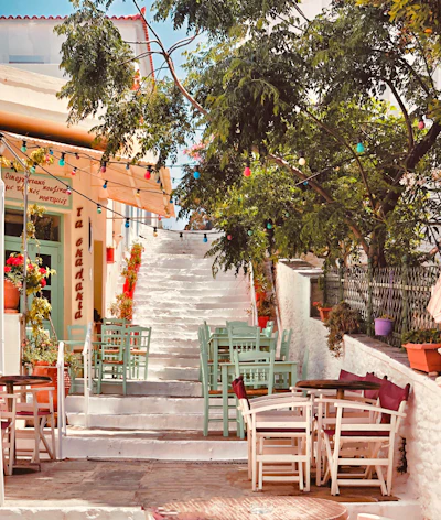 Rustic Greek taverna interior with traditional wooden tables and decor
