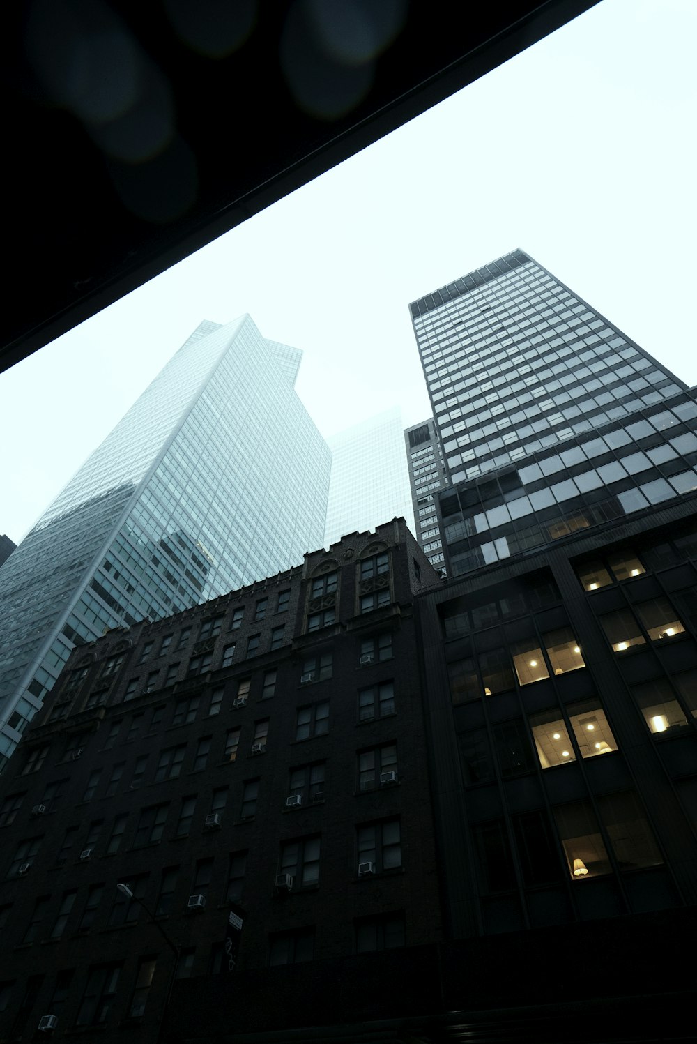 low angle photography of high rise building