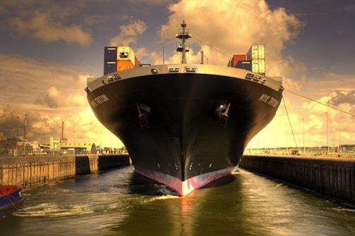 black and red ship on dock during daytime