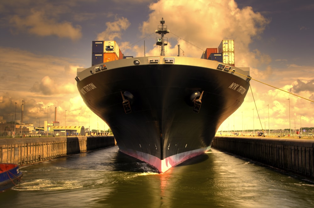 black and red ship on dock during daytime