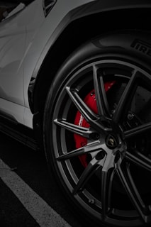 silver mercedes benz wheel on road