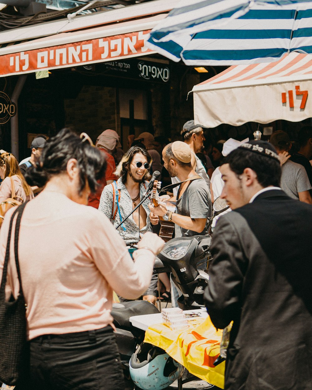 people walking on street during daytime