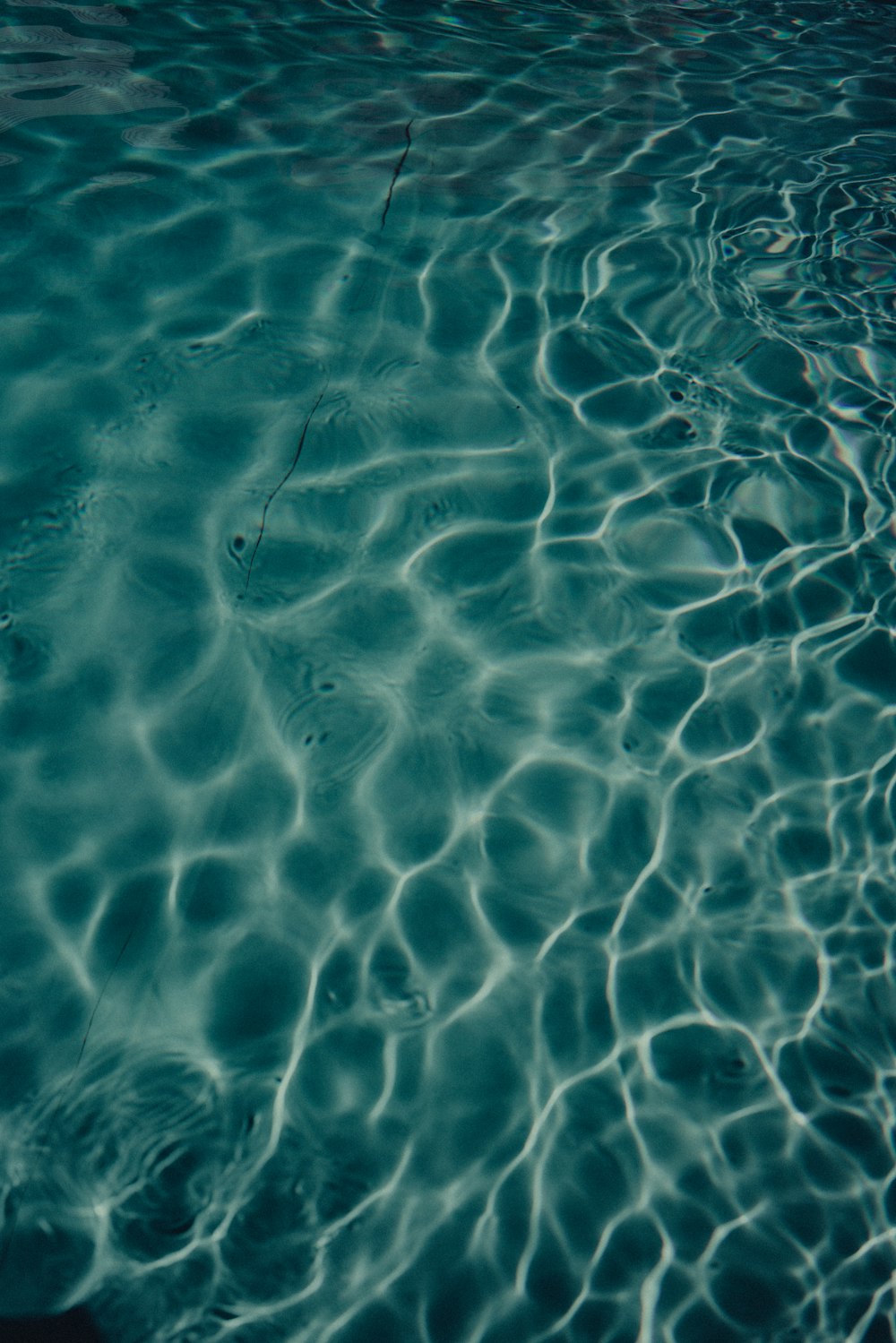 blue water with white bubbles