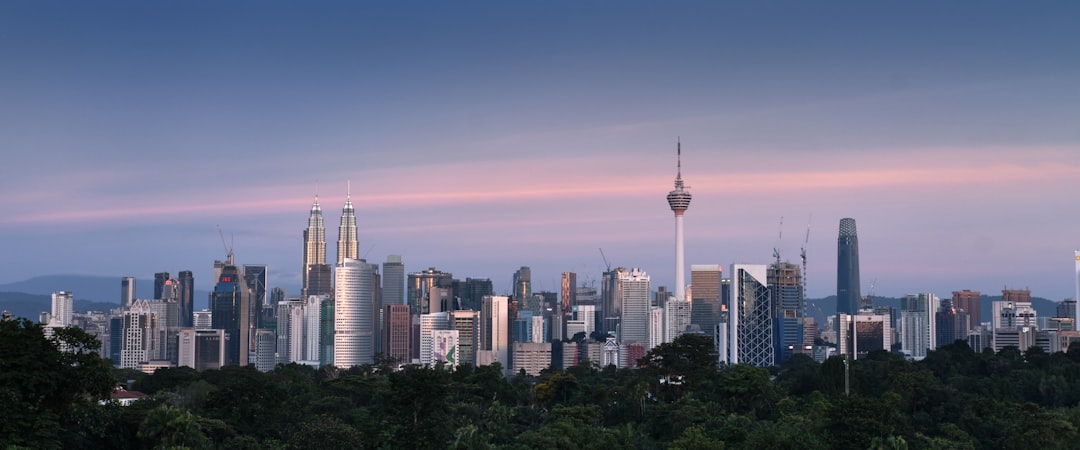 city skyline under blue sky during daytime