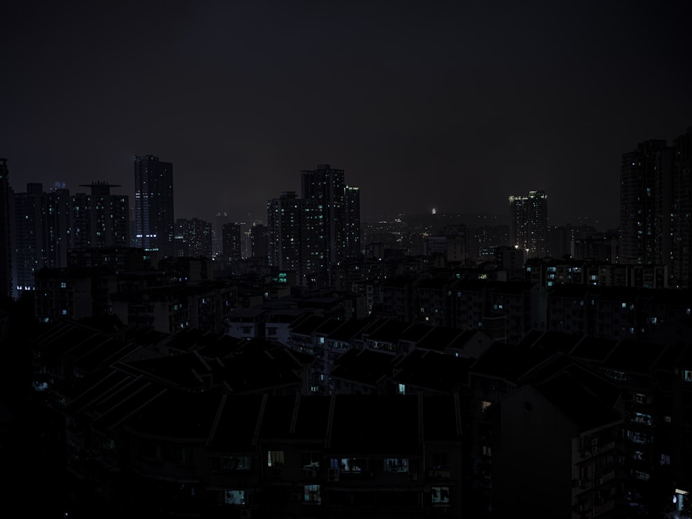 city skyline during night time